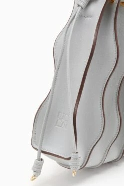 ULLA JOHNSON Adria Small Pleated Wave Bag - Agave 10 ULLA JOHNSON Adria Small Pleated Wave Bag - Agave -Lila's Closet FA231126 ADRIASMALLPLEATEDWAVEBAG AGAVE c r web